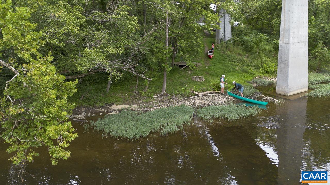 9195 Springwood Road Buchanan, VA 24066 - Photo 65 of 75 a backyard of a house with lots of green space and lake view