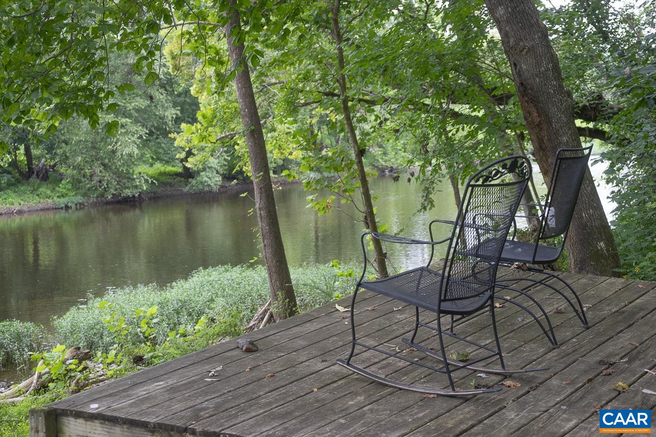 9195 Springwood Road Buchanan, VA 24066 - Photo 67 of 75 a view of a lake with a table and chairs