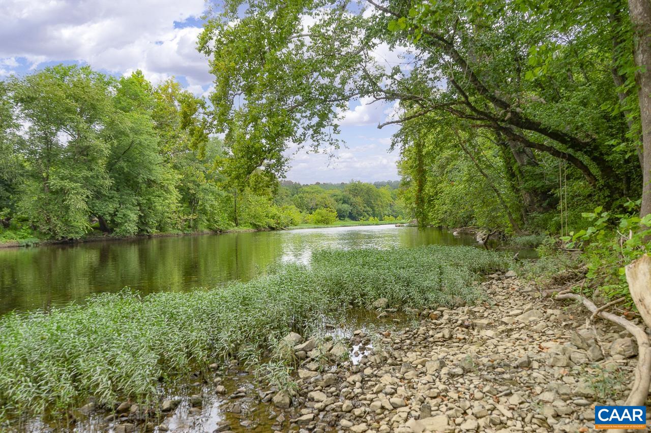 9195 Springwood Road Buchanan, VA 24066 - Photo 72 of 75 a view of a garden with a lake