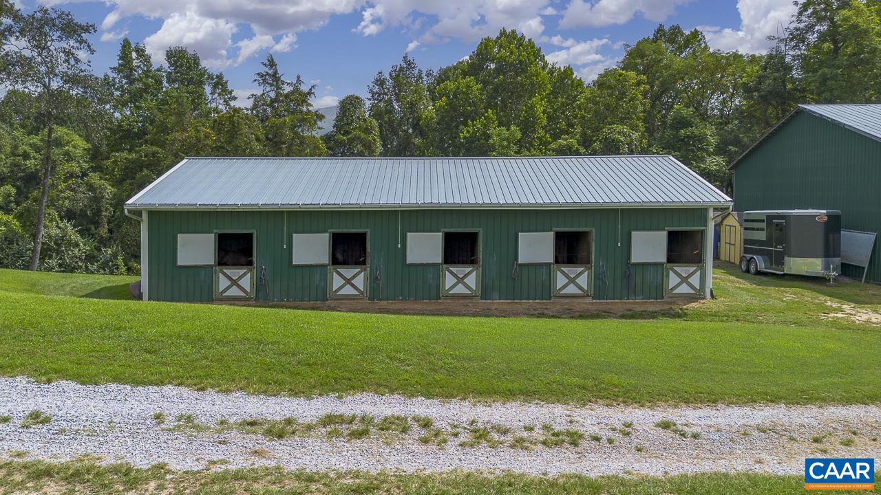 9195 Springwood Road Buchanan, VA 24066 - Photo 8 of 75 a front view of a house with a garden and yard