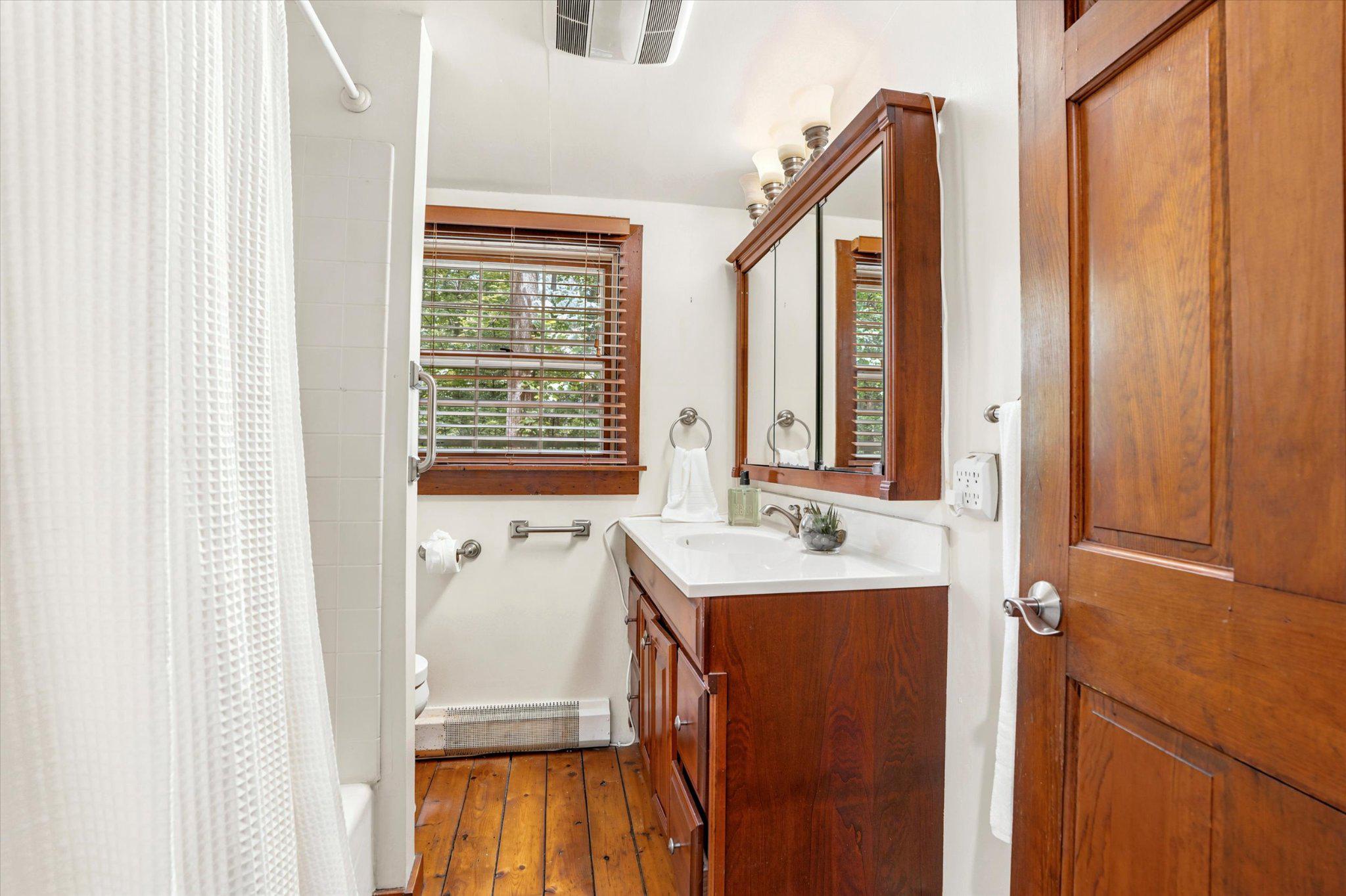 607 Kulp Road Perkiomenville, PA 18074 - Photo 22 of 39 Charming bathroom with rustic appeal.