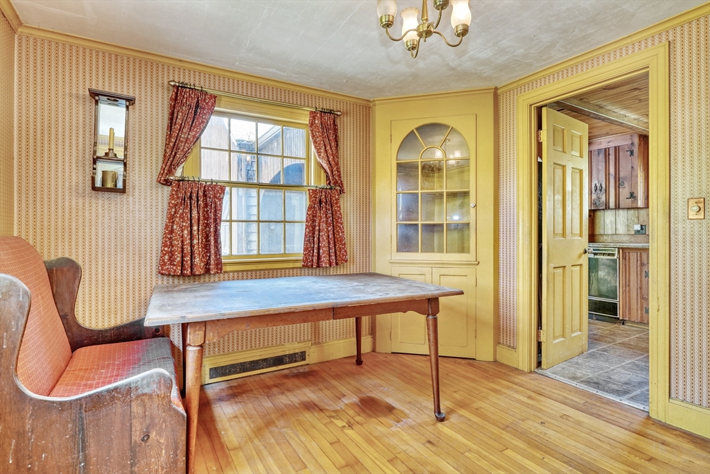 40 Lancaster Drive Westwood, MA 02090 - Photo 11 of 29 a living room with furniture and a window