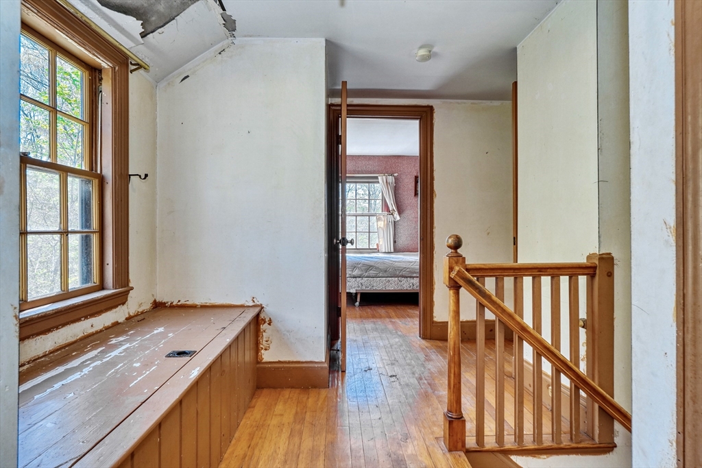 40 Lancaster Drive Westwood, MA 02090 - Photo 12 of 29 a view of a hallway with entryway and wooden floor