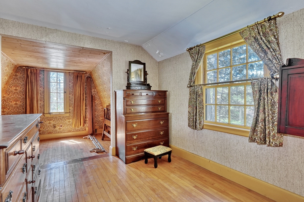 40 Lancaster Drive Westwood, MA 02090 - Photo 14 of 29 a room with furniture and a window