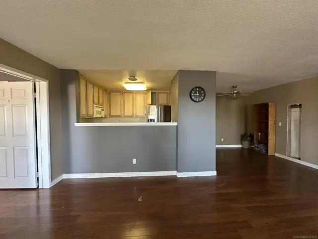 a view of a livingroom with furniture and wooden floor