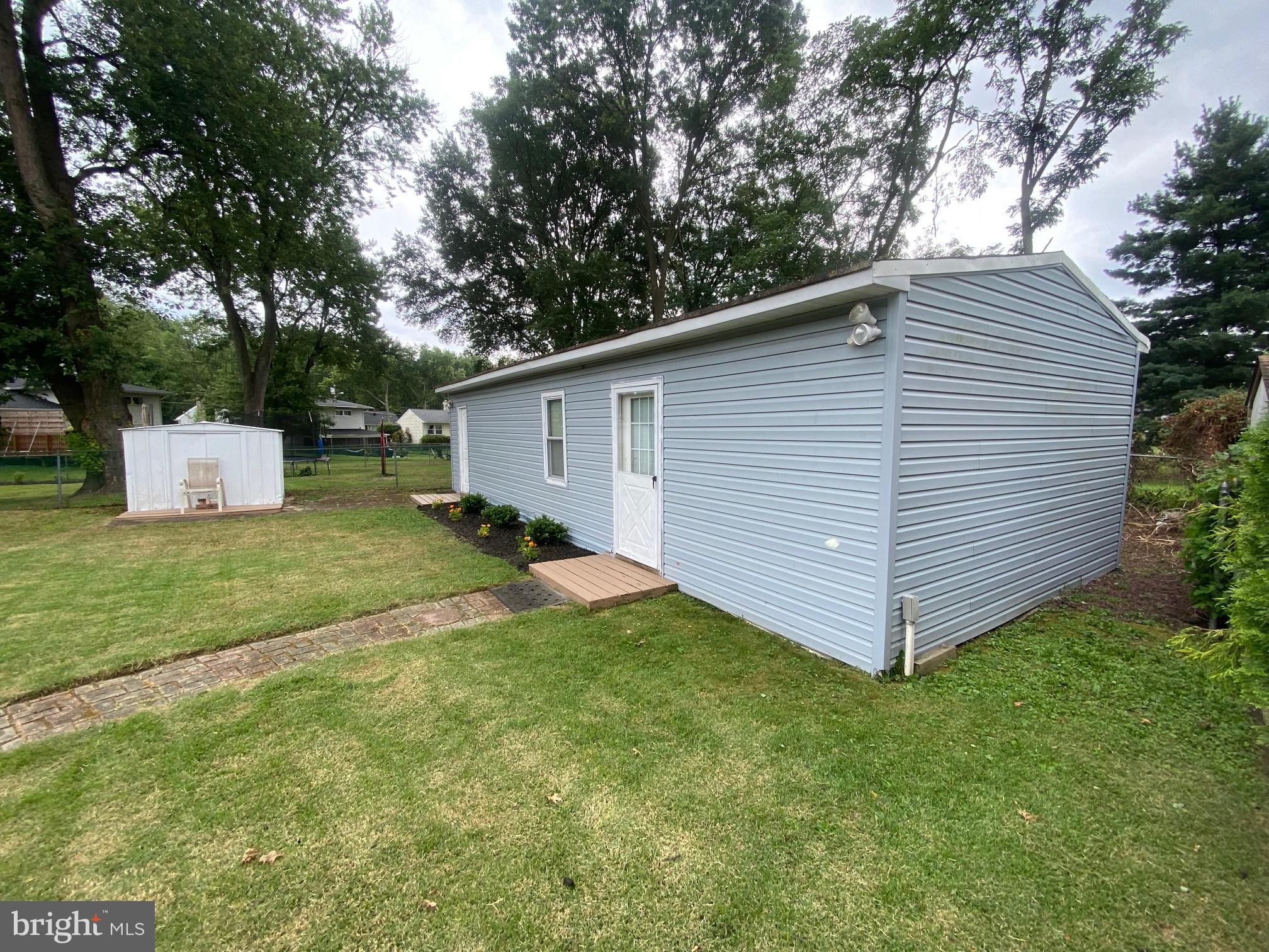 21 Timber Drive Barrington, NJ 08007 - Photo 8 of 45 Right view of bar/storage and front view shed