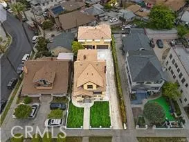 an aerial view of a house with garden