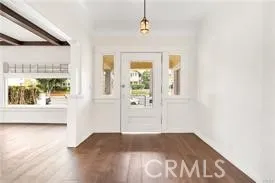 a view of front door and bedroom