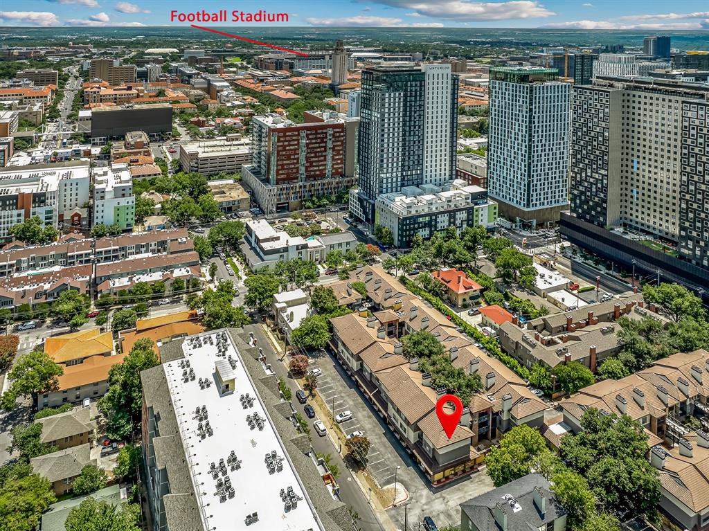 806 West 24th Street, Unit 214 Austin, TX 78705 - Photo 3 of 30 an aerial view of residential houses with outdoor space