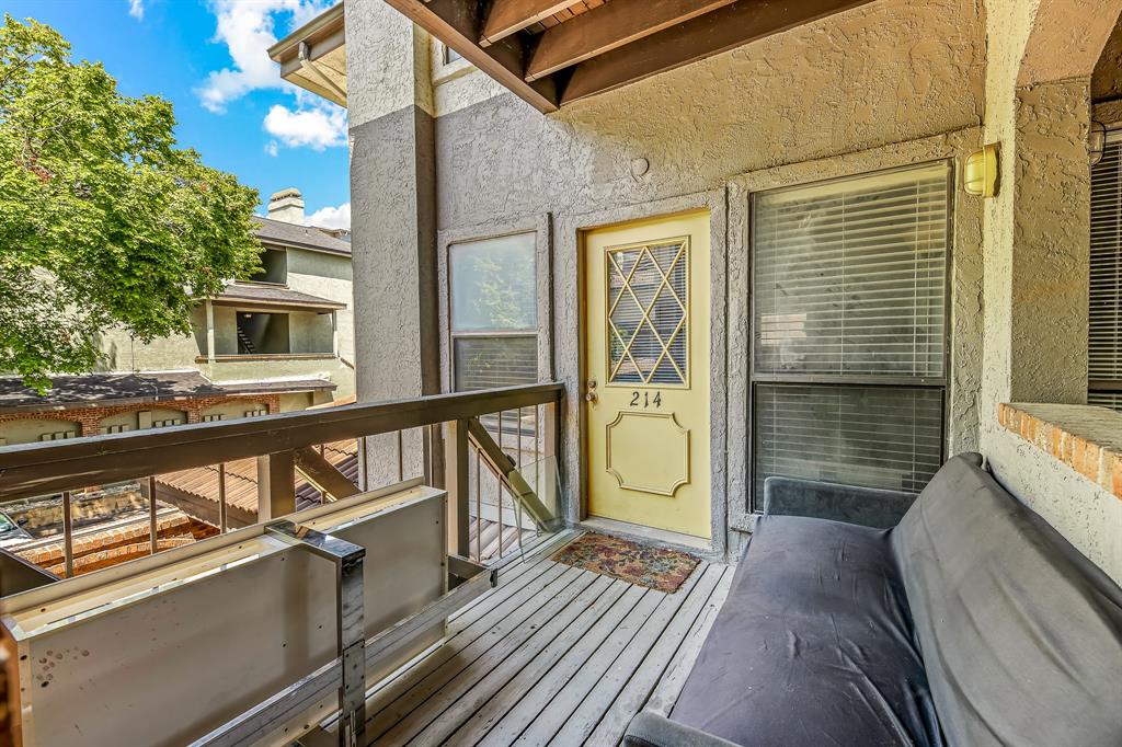 806 West 24th Street, Unit 214 Austin, TX 78705 - Photo 5 of 30 a view of a balcony with wooden floor