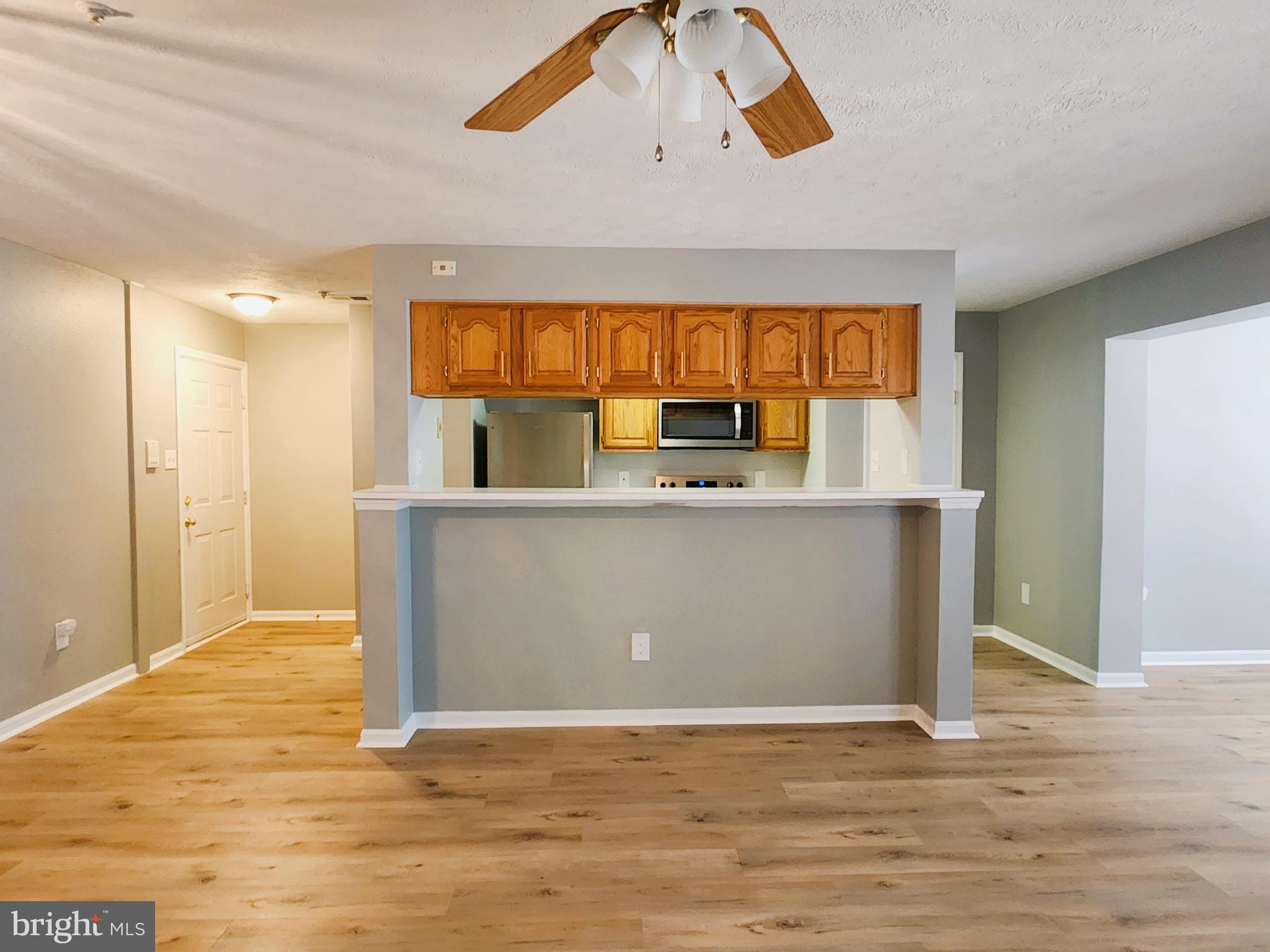 16 Laurel Path Court, Unit 1 Nottingham, MD 21236 - Photo 11 of 23 a view of kitchen with wooden floor