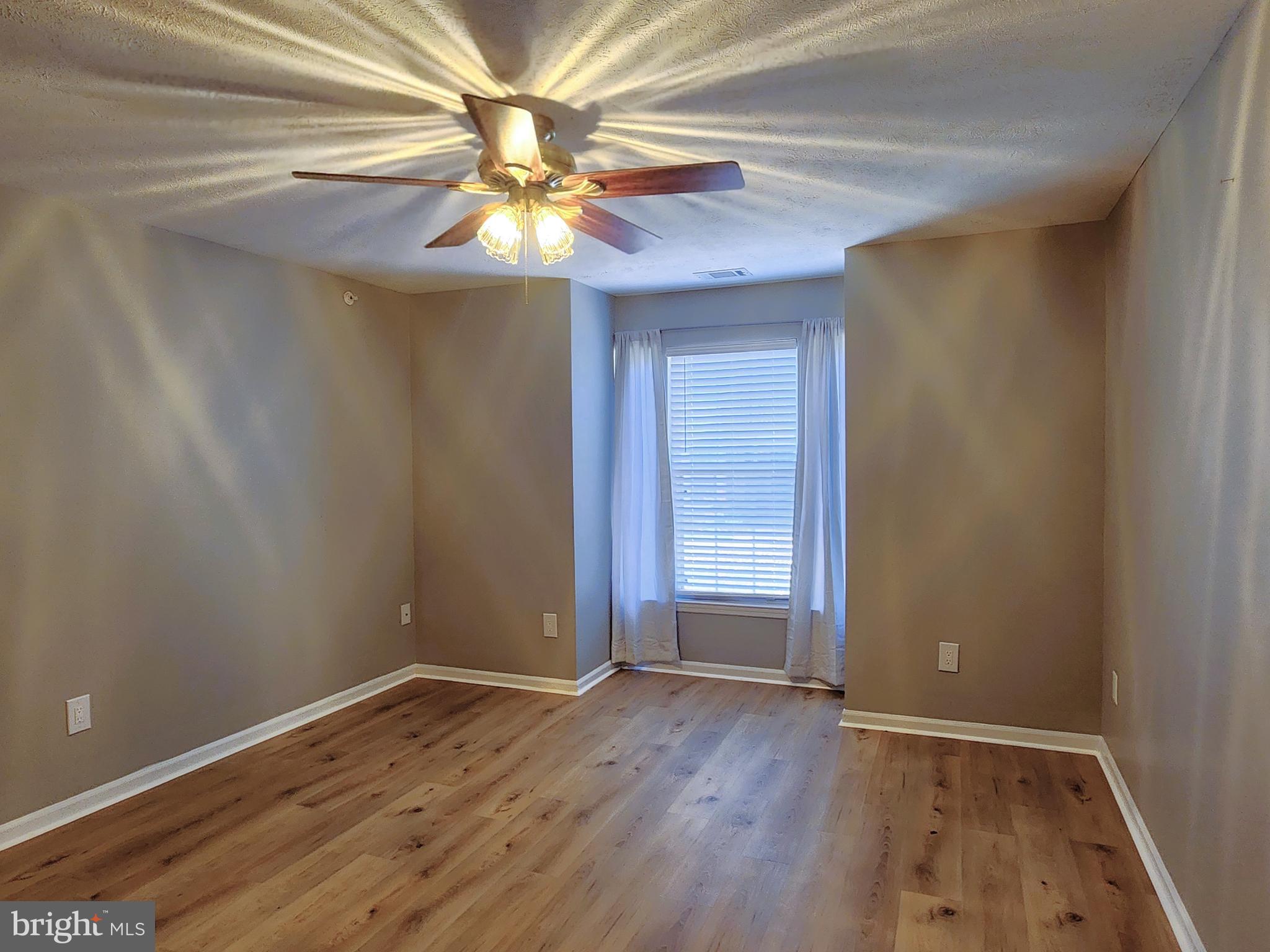 16 Laurel Path Court, Unit 1 Nottingham, MD 21236 - Photo 17 of 23 wooden floor in an empty room