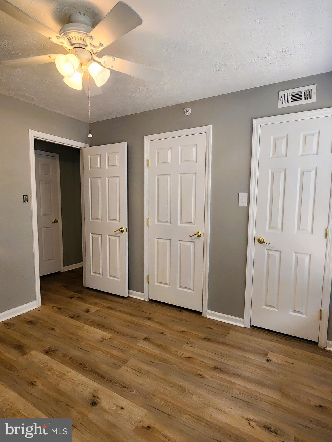 16 Laurel Path Court, Unit 1 Nottingham, MD 21236 - Photo 23 of 23 a view of empty room with wooden floor