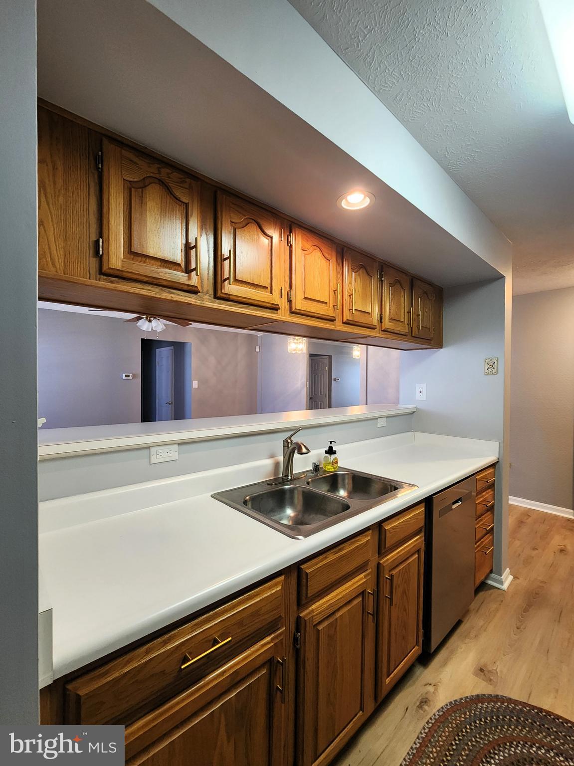 16 Laurel Path Court, Unit 1 Nottingham, MD 21236 - Photo 5 of 23 a kitchen with stainless steel appliances granite countertop a sink and cabinets