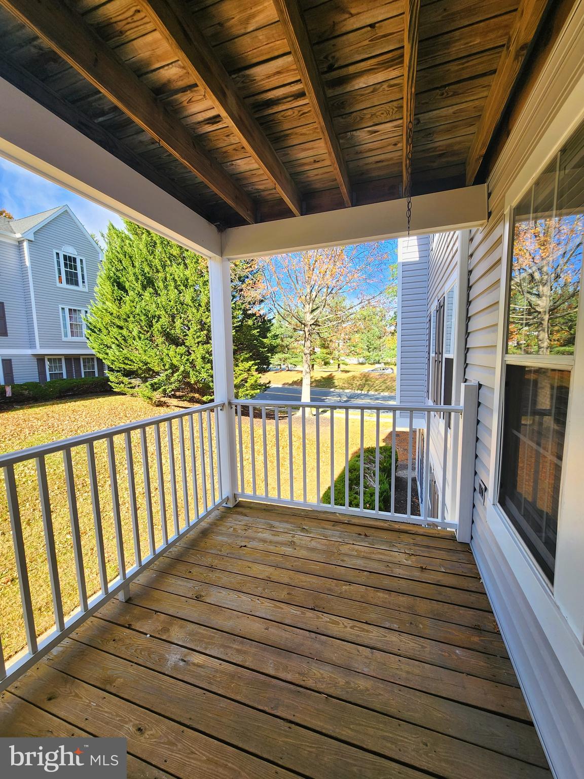 16 Laurel Path Court, Unit 1 Nottingham, MD 21236 - Photo 7 of 23 a view of balcony with wooden floor