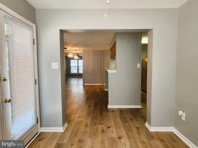 a view of kitchen with wooden floor