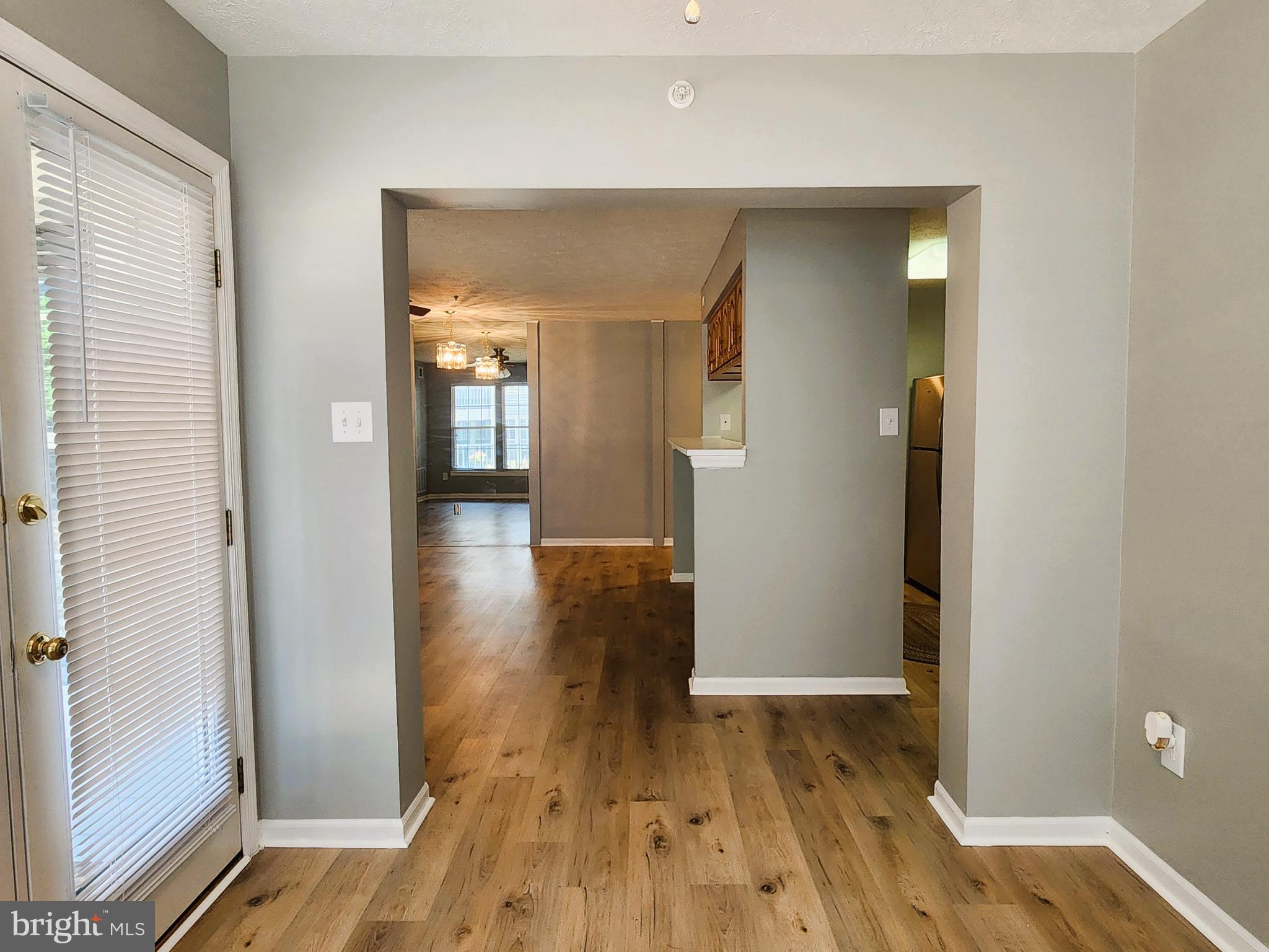 16 Laurel Path Court, Unit 1 Nottingham, MD 21236 - Photo 10 of 23 wooden floor in a gallery