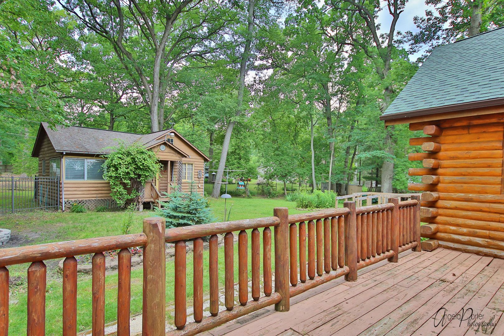 38304 North Briar Road Spring Grove, IL 60081 - Photo 14 of 39 a view of a wooden deck next to a yard