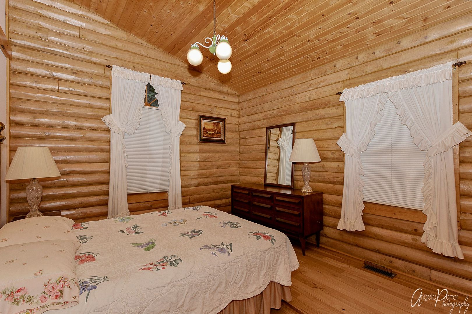 38304 North Briar Road Spring Grove, IL 60081 - Photo 17 of 39 a bedroom with a bed and dresser with wooden floor