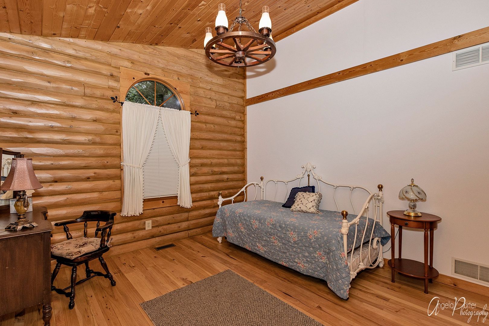 38304 North Briar Road Spring Grove, IL 60081 - Photo 18 of 39 a bedroom with a bed and wooden floor