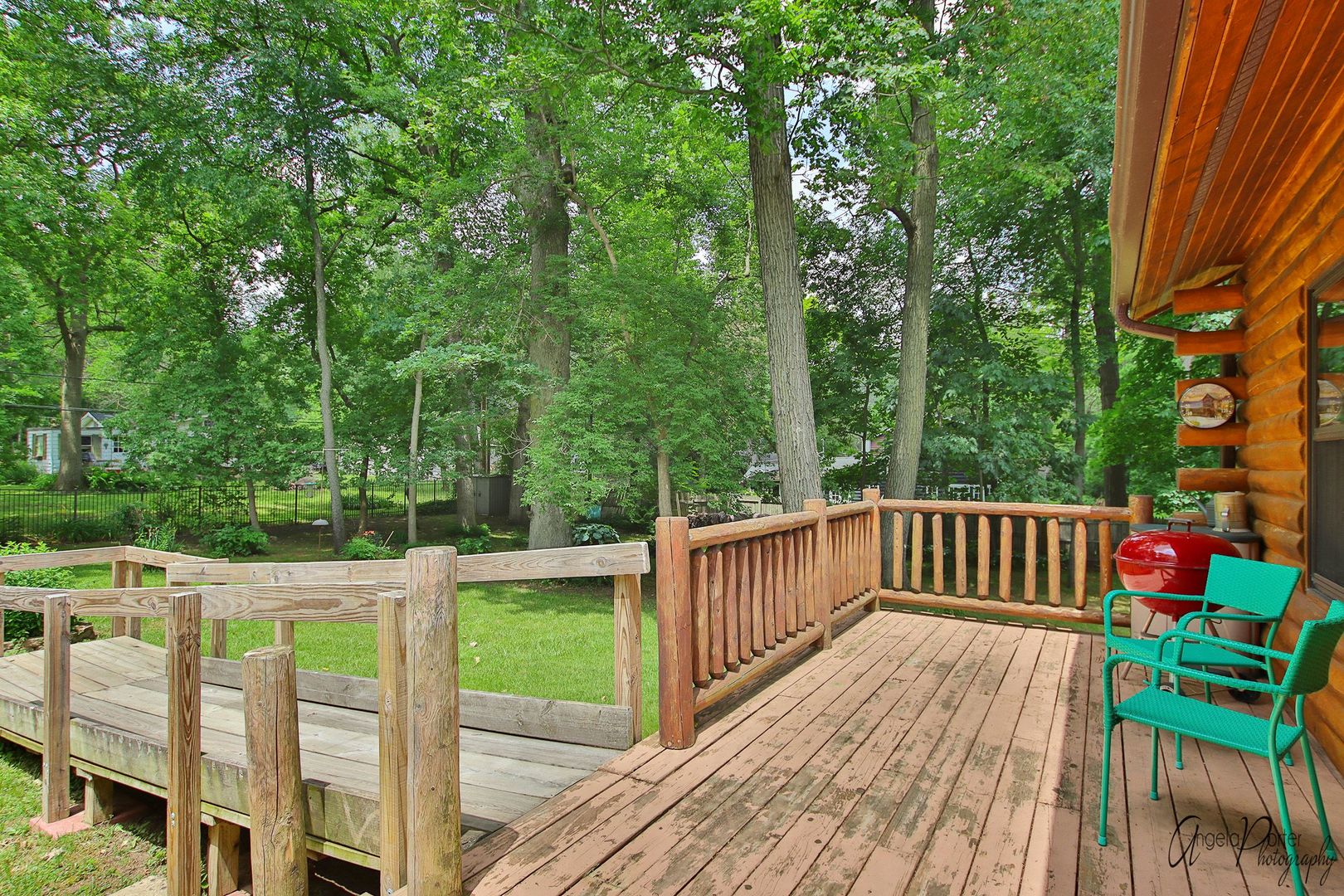 38304 North Briar Road Spring Grove, IL 60081 - Photo 27 of 39 a view of a wooden deck and a yard with swimming pool