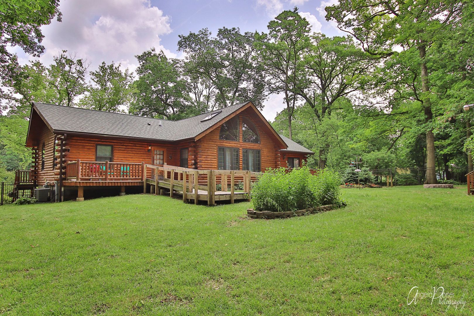 38304 North Briar Road Spring Grove, IL 60081 - Photo 30 of 39 a front view of a house with yard and green space