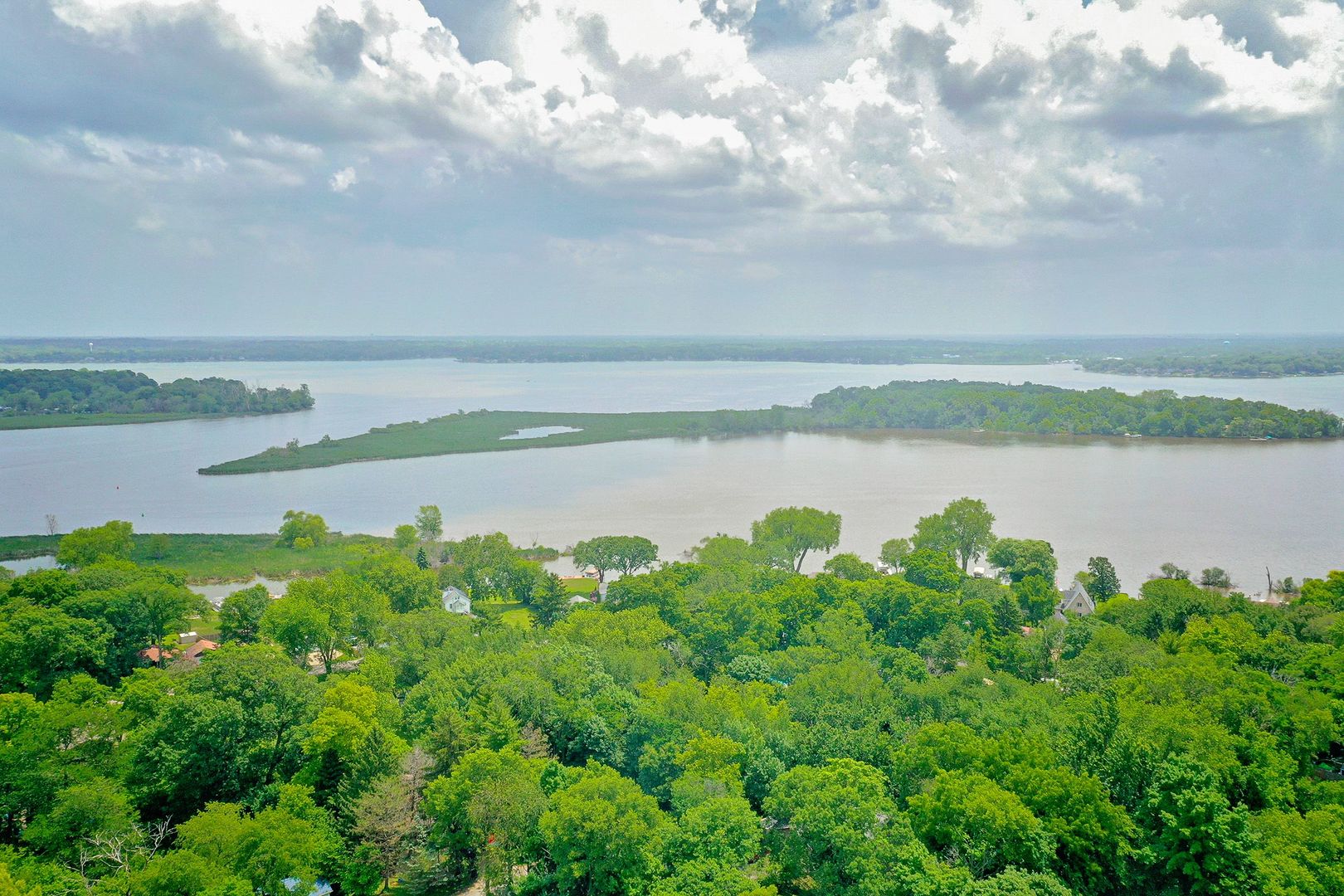 38304 North Briar Road Spring Grove, IL 60081 - Photo 35 of 39 a view of a lake with houses in back
