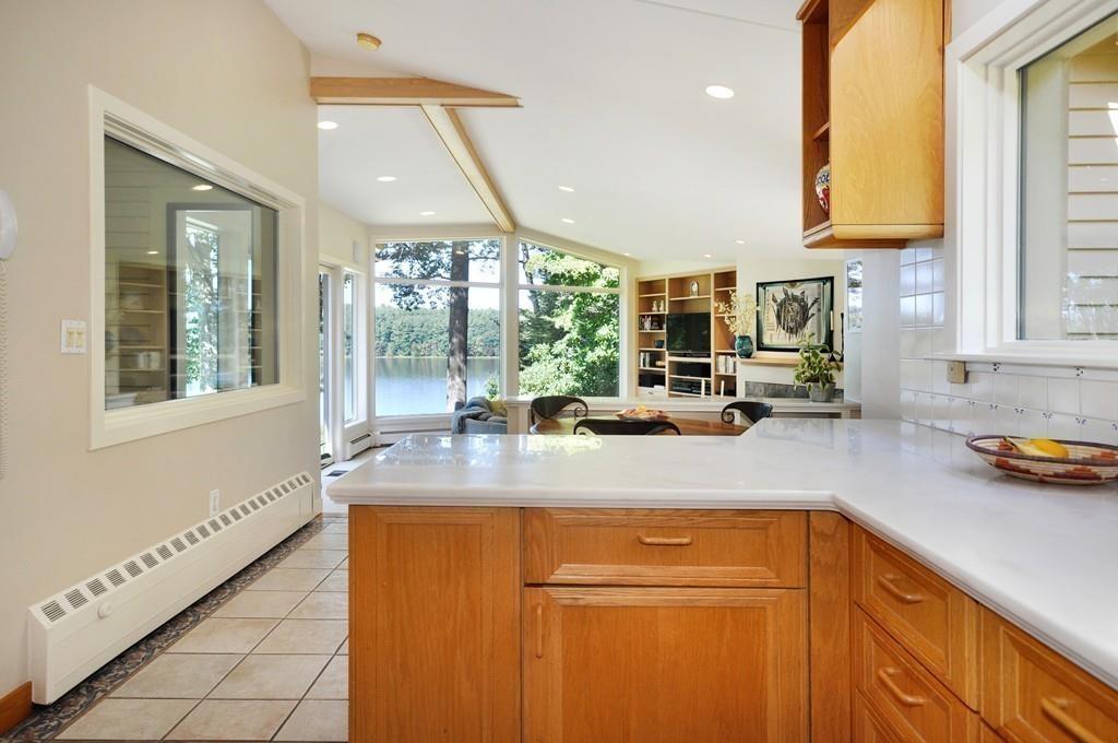 263 Old Concord Road Lincoln, MA 01773 - Photo 12 of 41 a kitchen with sink a window and cabinets
