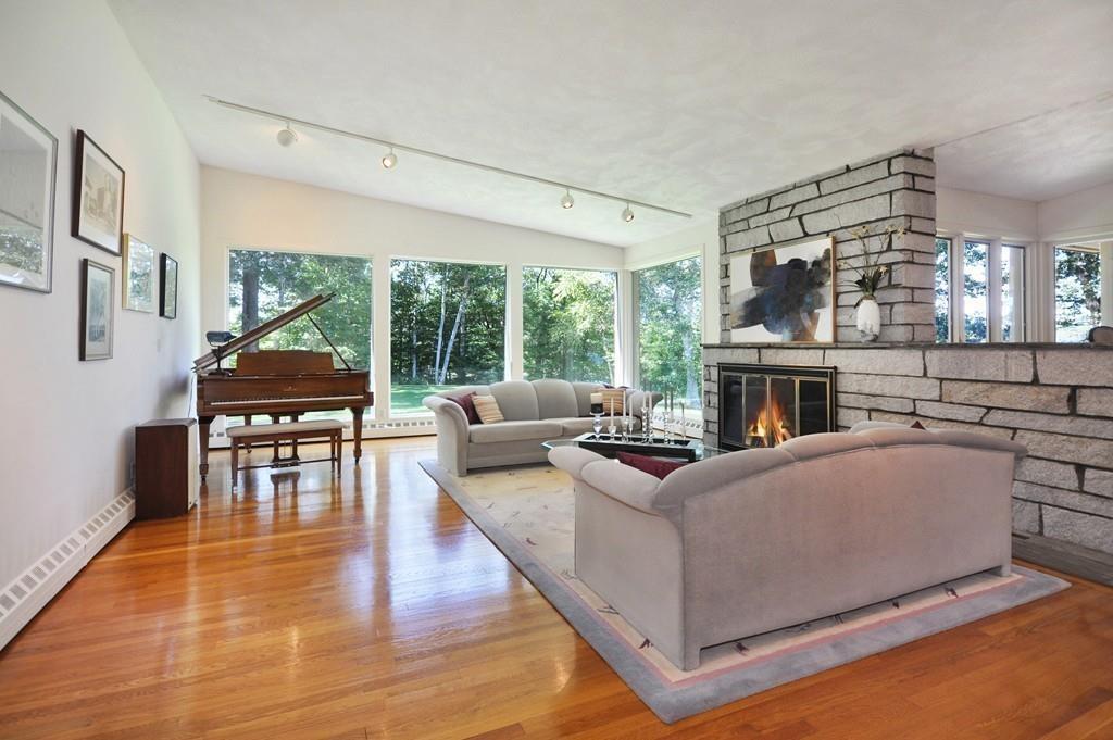 263 Old Concord Road Lincoln, MA 01773 - Photo 13 of 41 a living room with furniture and a fireplace