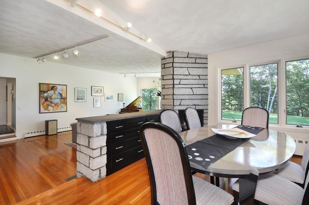 263 Old Concord Road Lincoln, MA 01773 - Photo 16 of 41 a workspace with furniture a couch and wooden floor