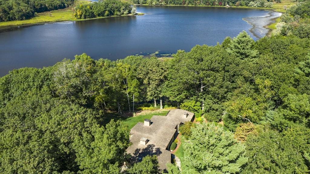 263 Old Concord Road Lincoln, MA 01773 - Photo 2 of 41 an aerial view of a house with a yard and lake view
