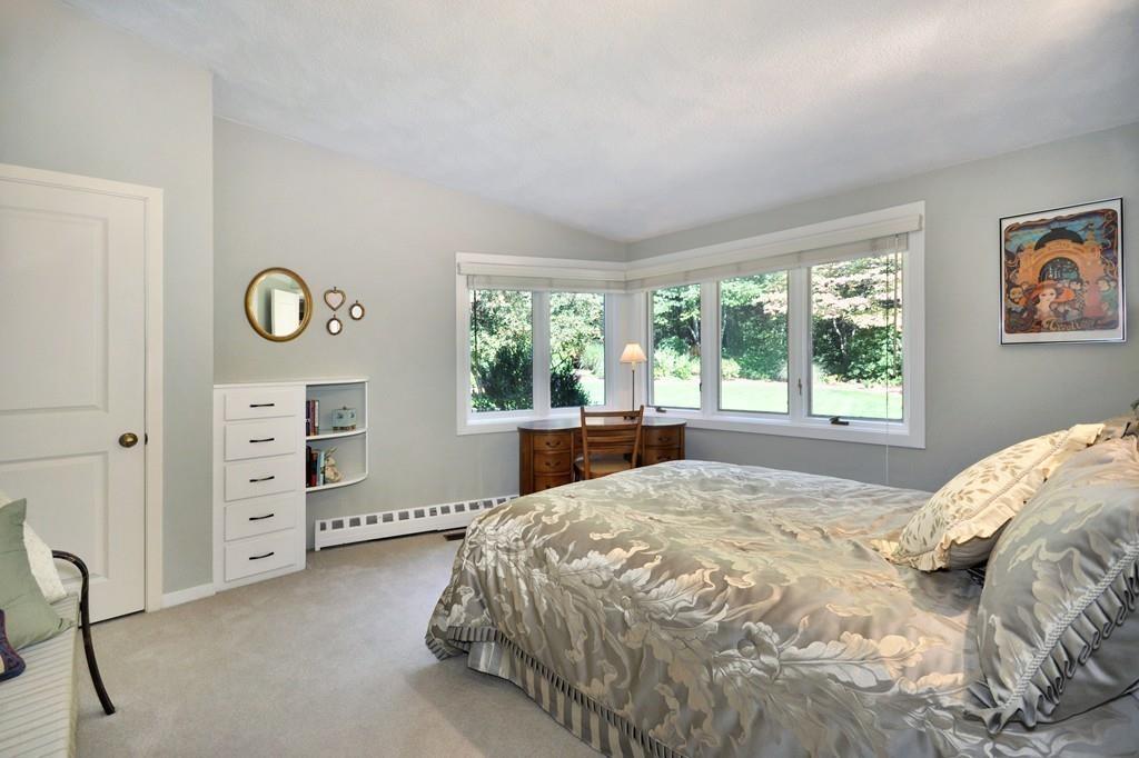 263 Old Concord Road Lincoln, MA 01773 - Photo 21 of 41 a bedroom with a bed and a window