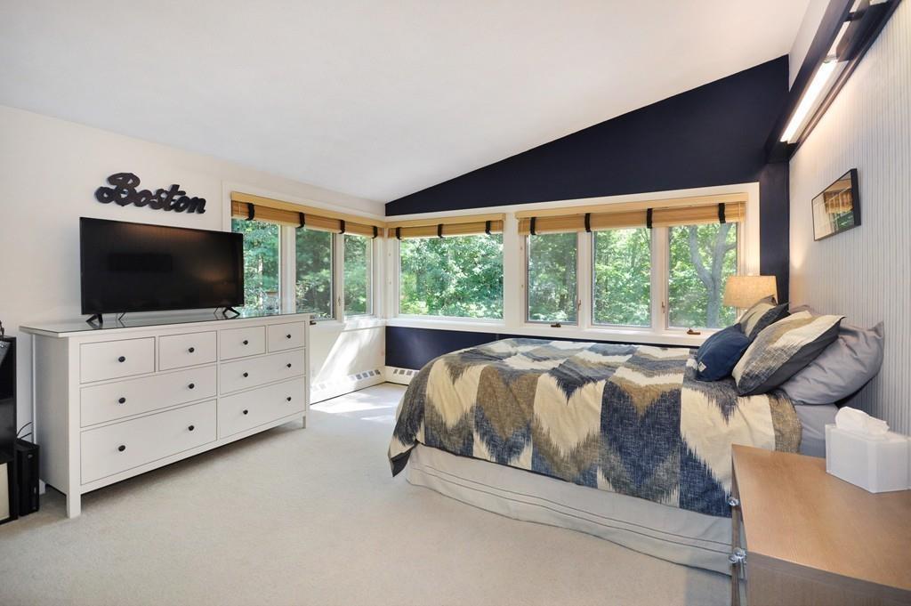 263 Old Concord Road Lincoln, MA 01773 - Photo 22 of 41 a living room with furniture and a flat screen tv