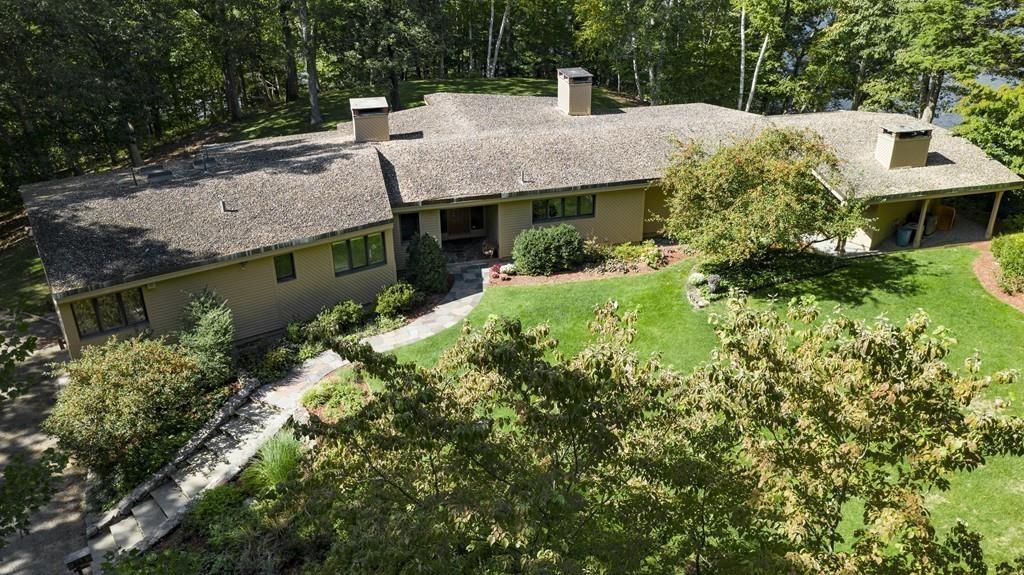 263 Old Concord Road Lincoln, MA 01773 - Photo 34 of 41 a front view of house with yard and trees around