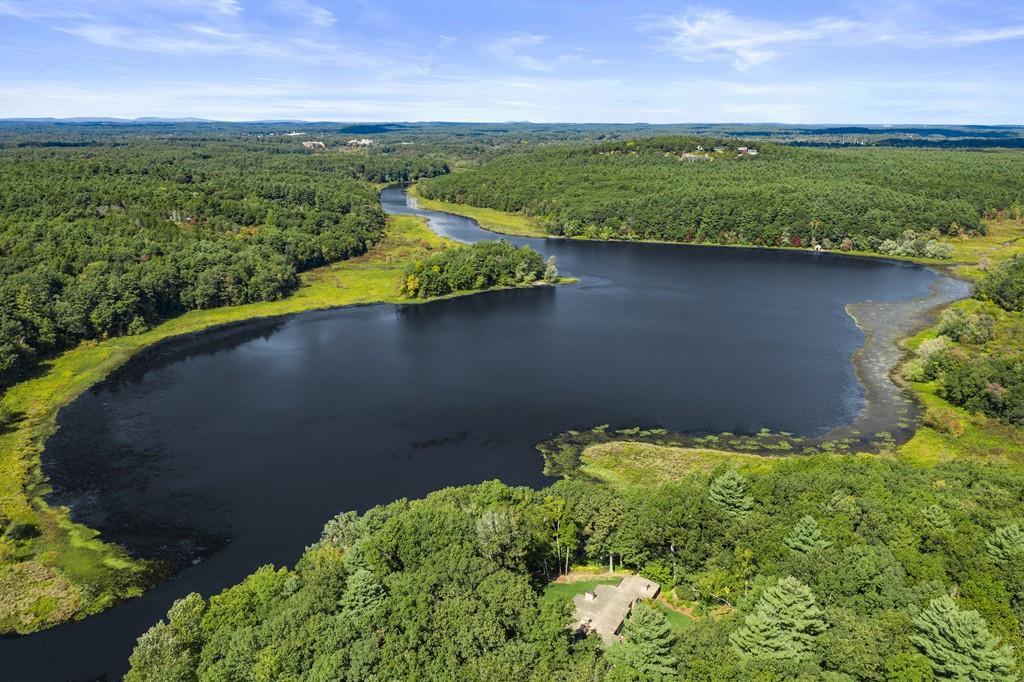 263 Old Concord Road Lincoln, MA 01773 - Photo 37 of 41 an aerial view of a houses with a yard and lake view