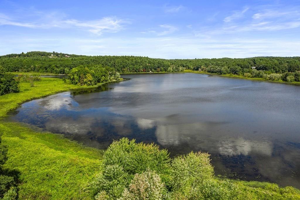 263 Old Concord Road Lincoln, MA 01773 - Photo 5 of 41 a view of a lake with houses in the back