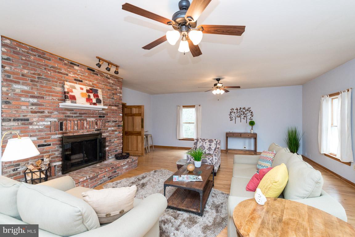 3229 Cragun Road Edgewater, MD 21037 - Photo 12 of 30 Rustic fireplace with heatilator