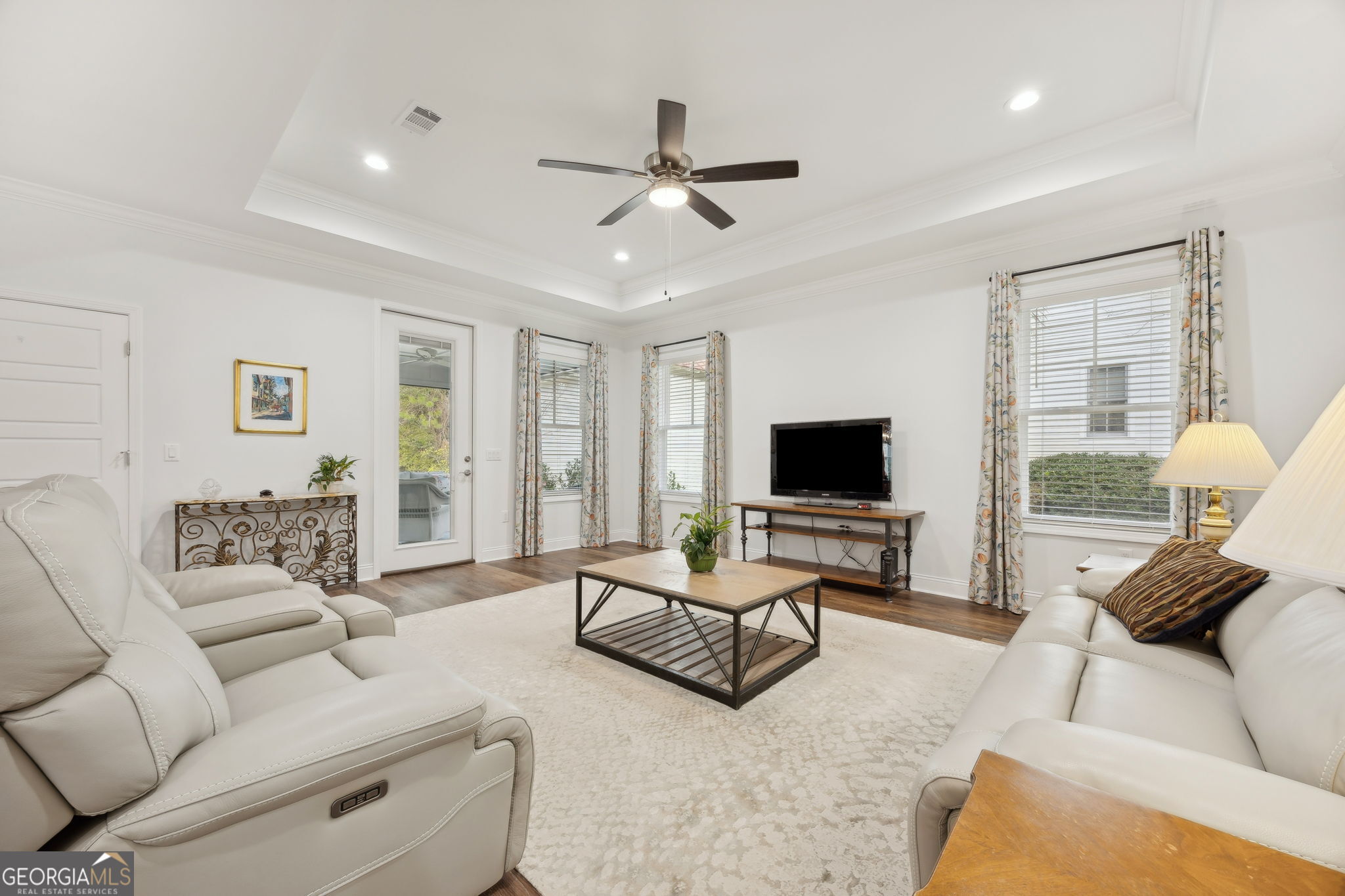 212 Placid Road St. Marys, GA 31558 - Photo 11 of 75 a living room with furniture and a flat screen tv