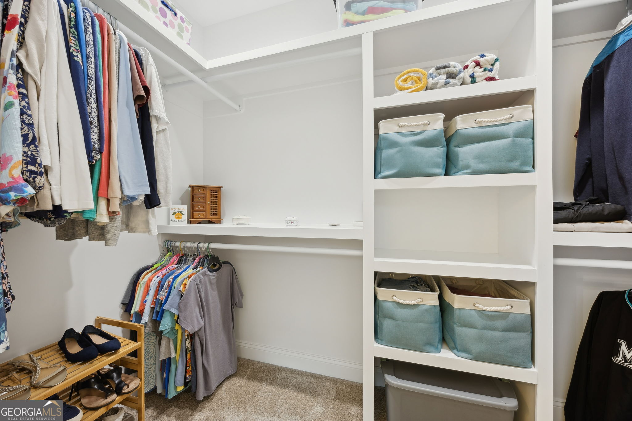212 Placid Road St. Marys, GA 31558 - Photo 24 of 75 a view of walk in closet with clothes and shoes