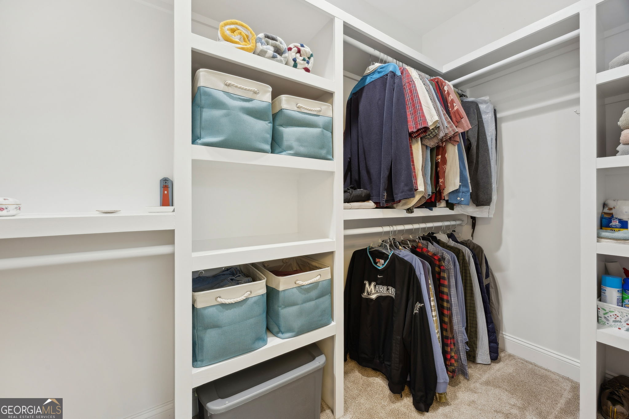 212 Placid Road St. Marys, GA 31558 - Photo 25 of 75 a view of walk in closet with clothes and shoes