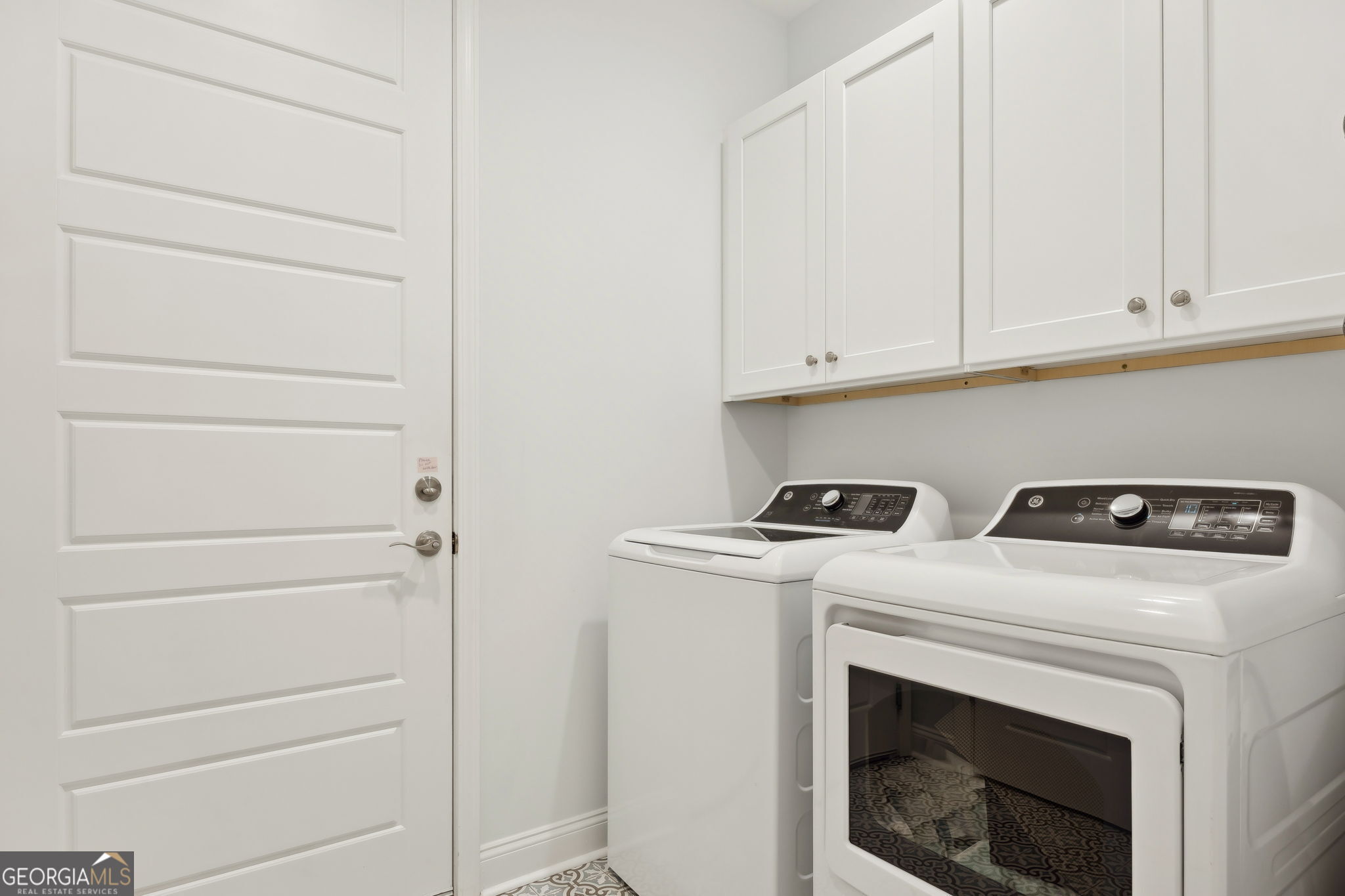212 Placid Road St. Marys, GA 31558 - Photo 29 of 75 a utility room with dryer and washer