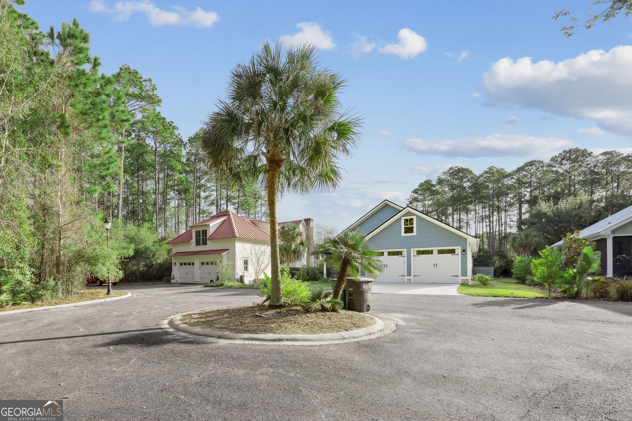 212 Placid Road St. Marys, GA 31558 - Photo 38 of 75 a front view of a house with a yard and garage