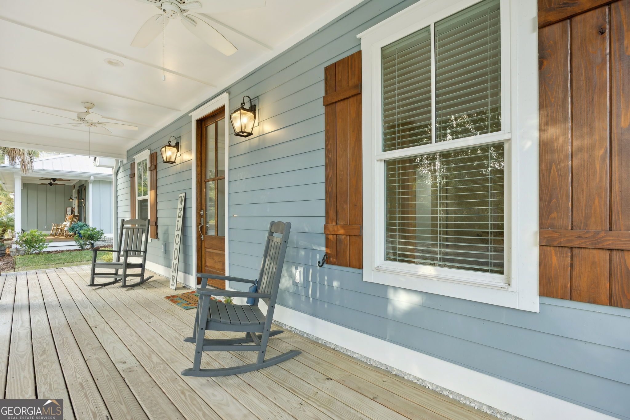 212 Placid Road St. Marys, GA 31558 - Photo 5 of 75 a view of a deck with chair and table in the patio