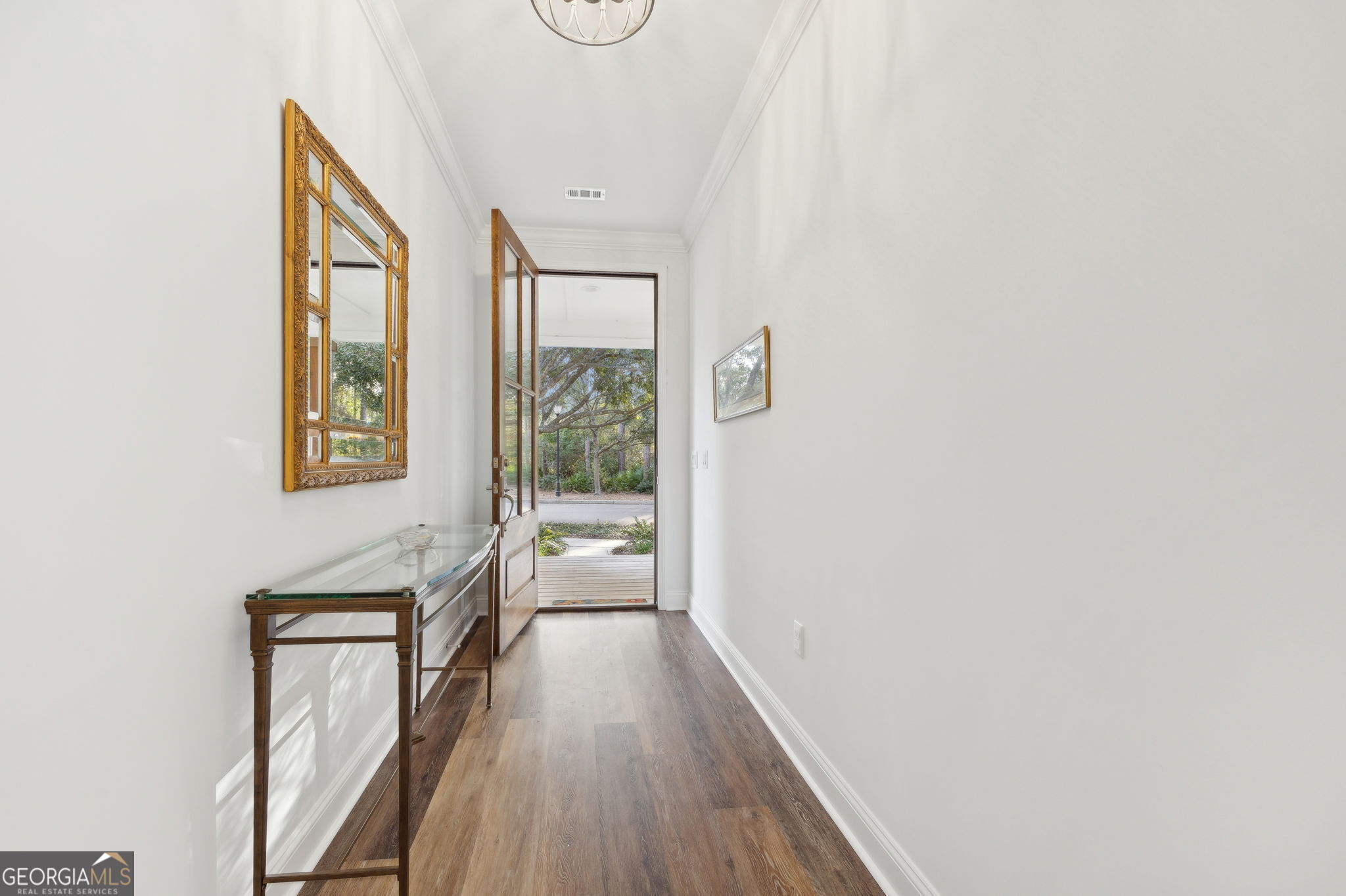 212 Placid Road St. Marys, GA 31558 - Photo 8 of 75 a view of hallway with wooden floor and stairs