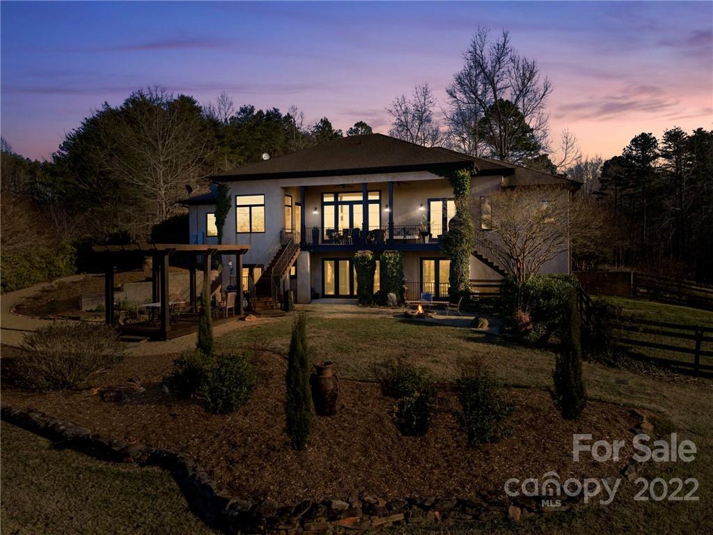 207 Herbert Page Road Tryon, NC 28782 - Photo 46 of 47 a view of a house with a yard