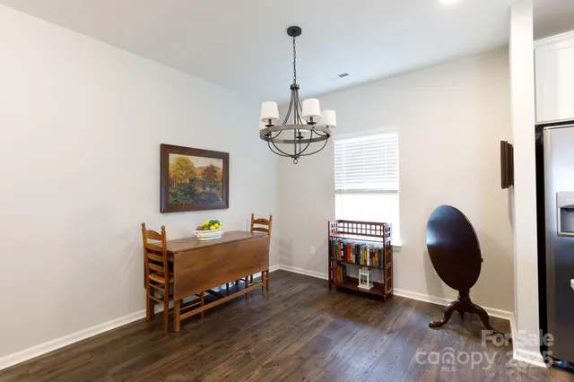 a bedroom with bed and a window