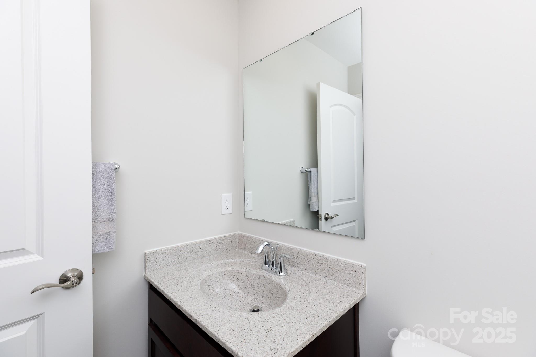 50109 Robins Nest Lane Lancaster, SC 29720 - Photo 21 of 45 a bathroom with a sink and a mirror