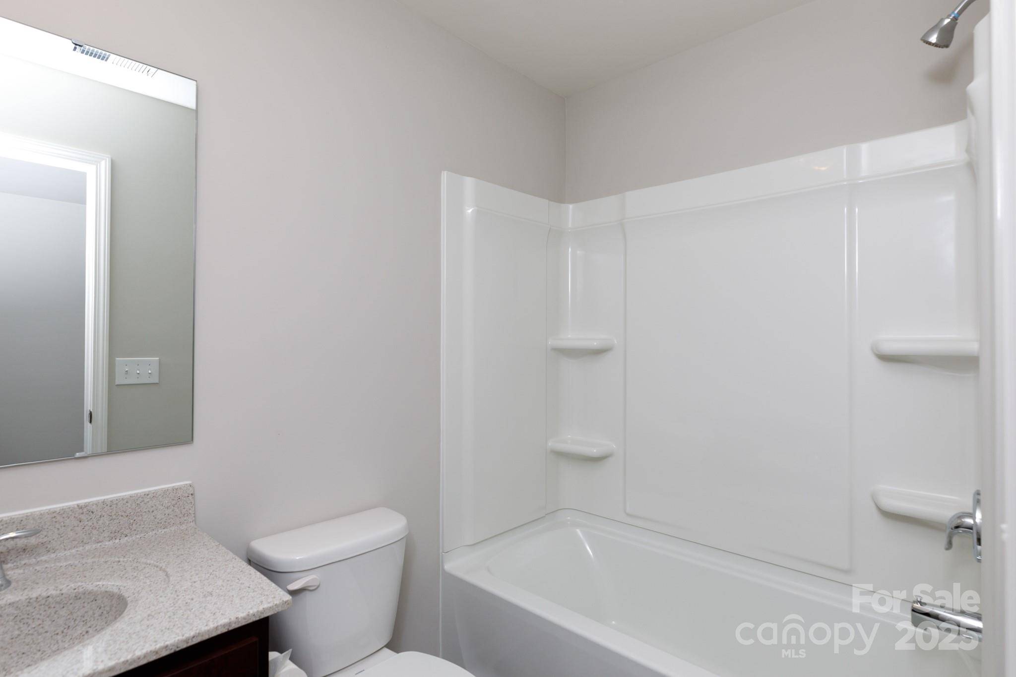 50109 Robins Nest Lane Lancaster, SC 29720 - Photo 22 of 45 a bathroom with a sink a toilet and shower