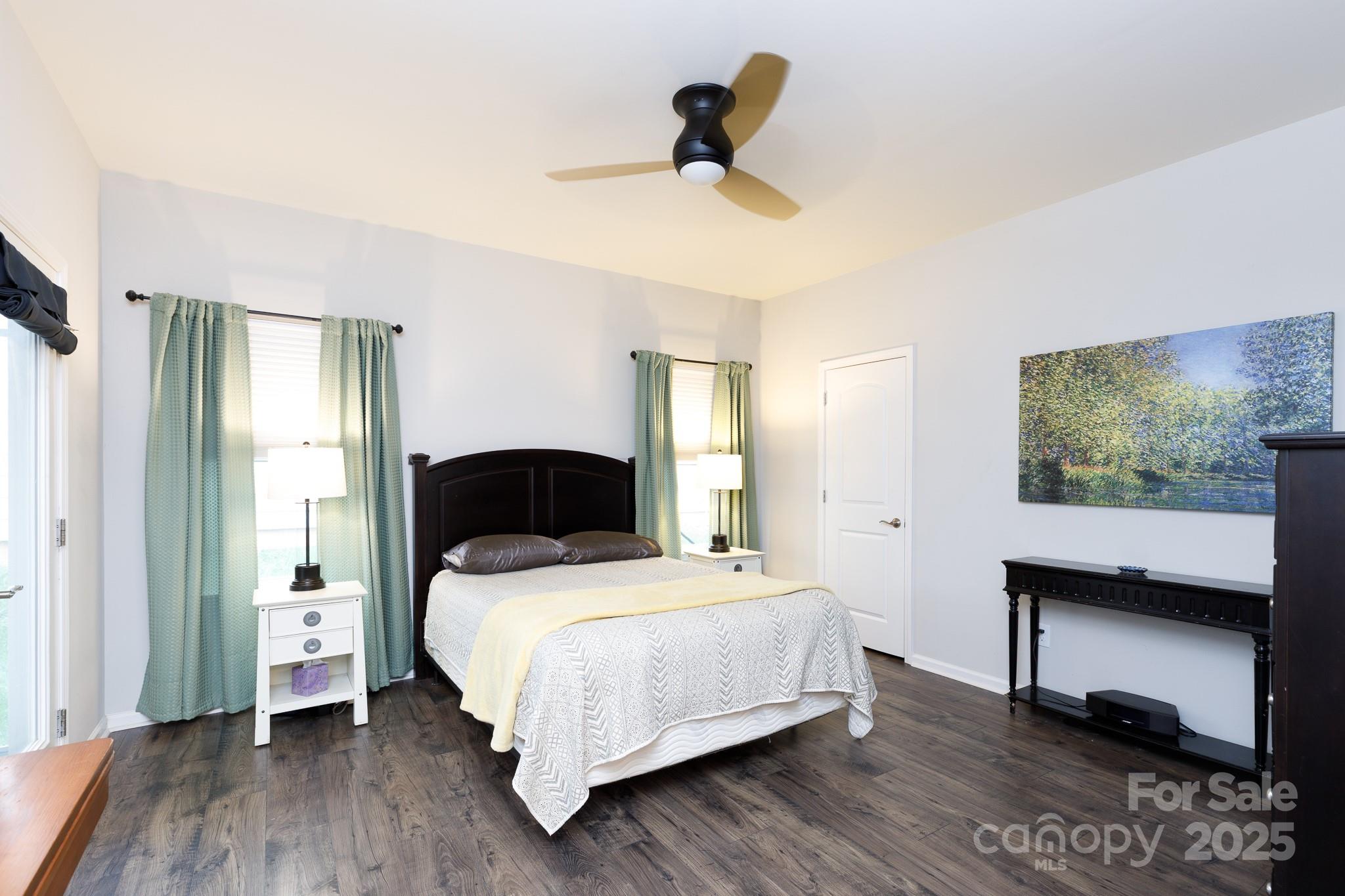 50109 Robins Nest Lane Lancaster, SC 29720 - Photo 23 of 45 a bedroom with a bed and a chandelier