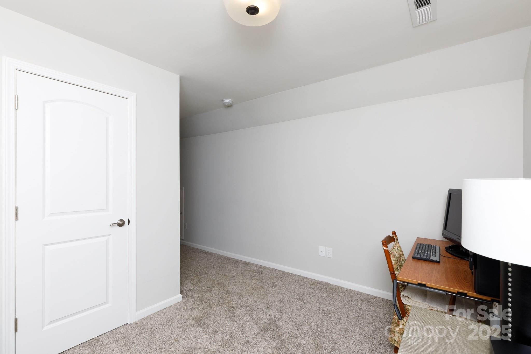 50109 Robins Nest Lane Lancaster, SC 29720 - Photo 25 of 45 a view of workspace room with wooden floor and chair